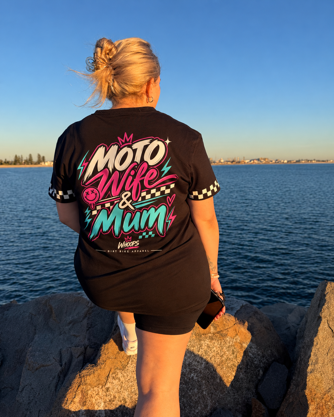 WHOOPS Moto Wife & Mum black tee with checker sleeves and colourful back print